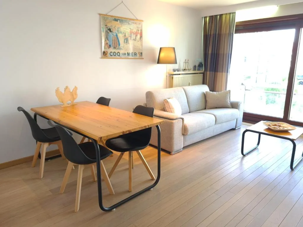 Woonkamer van Appartement Cormoran